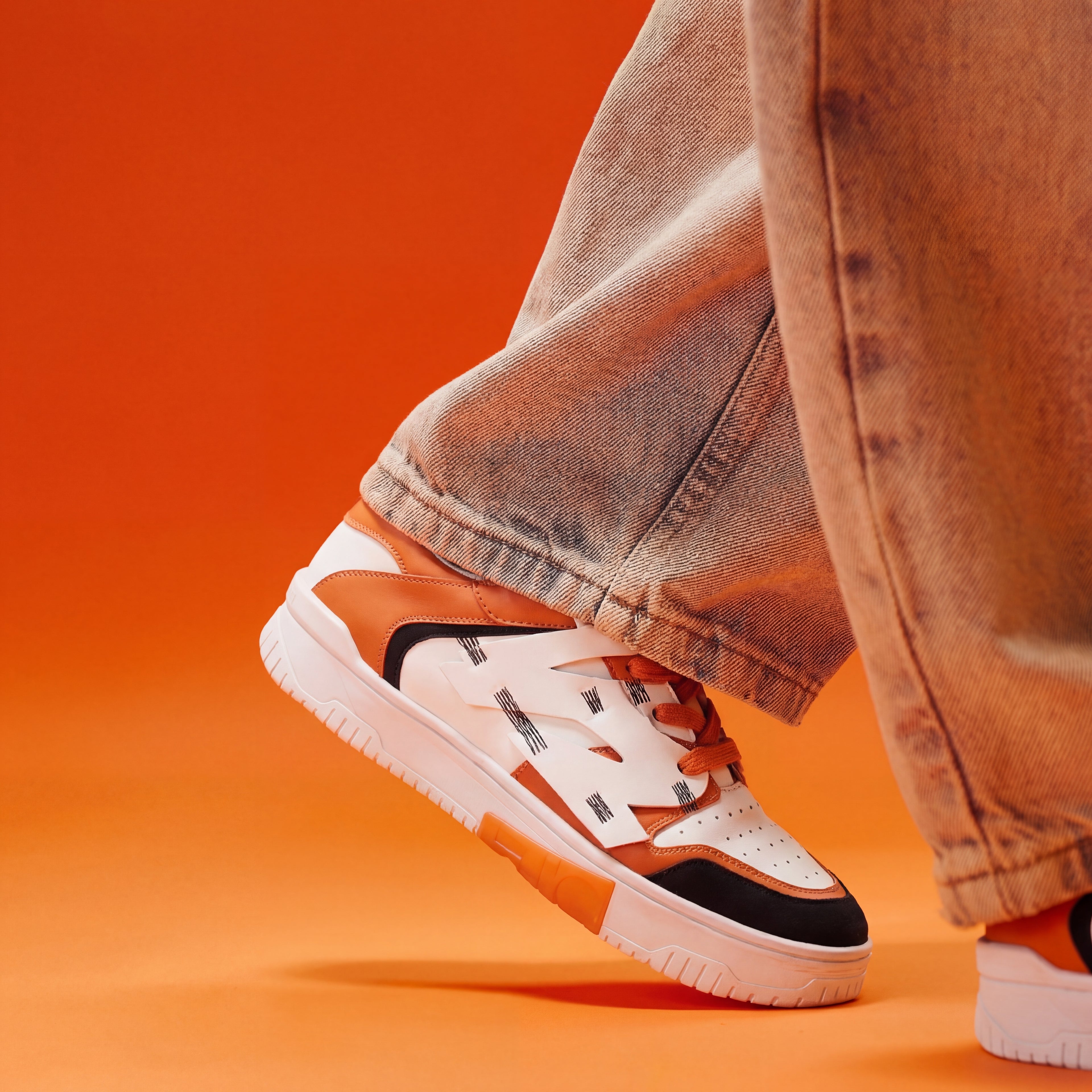 735 Cheeto Chunky Orange Low-Top Sneakers